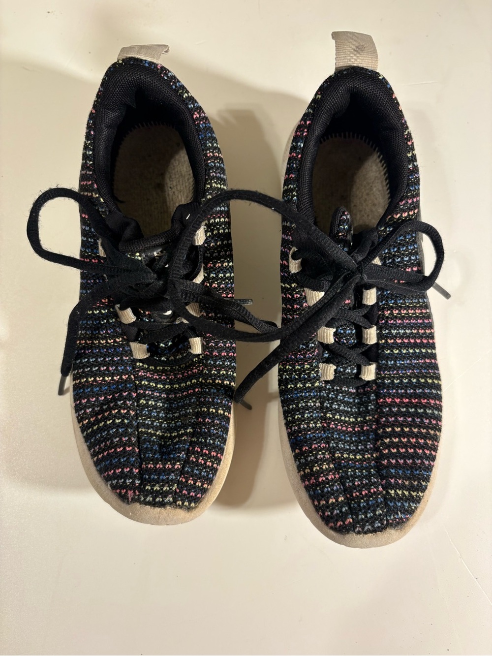 Nike Kids Black Sneakers with Multicolor Stripe Accents